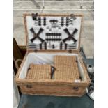 A VINTAGE WICKER HAMPER BASKET AND SET