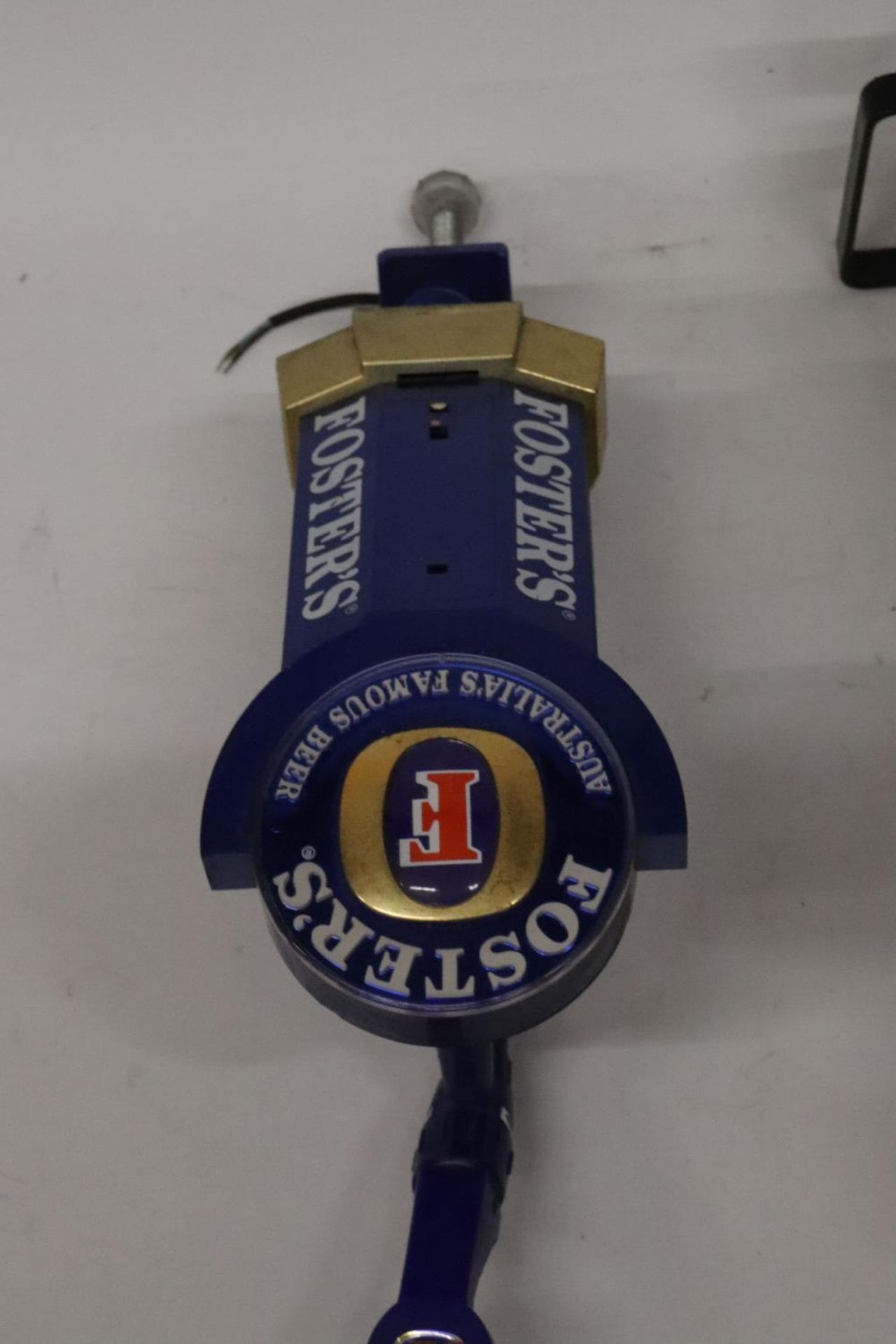 A FOSTERS BEER PUMP AND A THEAKSTONS PUMP - Image 2 of 3