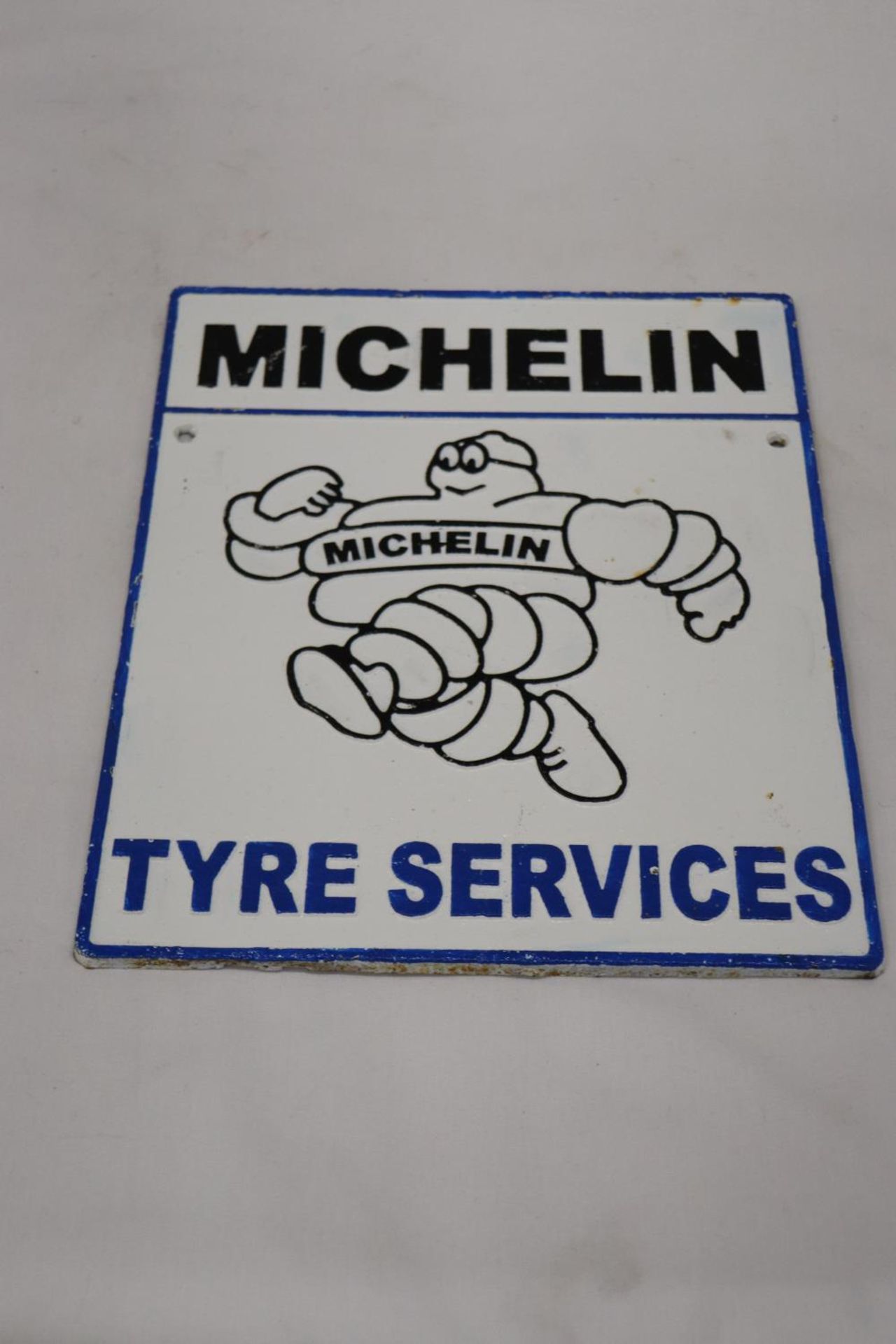 A CAST MICHELIN TYRE SERVICES SIGN 24CM X 30CM