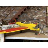 A LARGE MODEL OF PLANE WITH A PROPELLER, LENGTH APPROX 106CM, HEIGHT 23CM