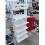 A WOODEN 'WOODWICK' SHOP DISPLAY STAND