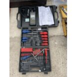 AN ASSORTMENT OF TOOLS TO INCLUDE A SCREW DRIVER SET AND A PORTABLE MICROPROCESSOR ETC