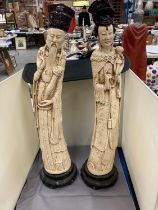 A PAIR OF ORIENTAL FIGURES - 22 INCH TALL