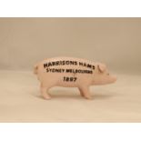 A HEAVY CAST BUTCHERS PIG MONEY BOX