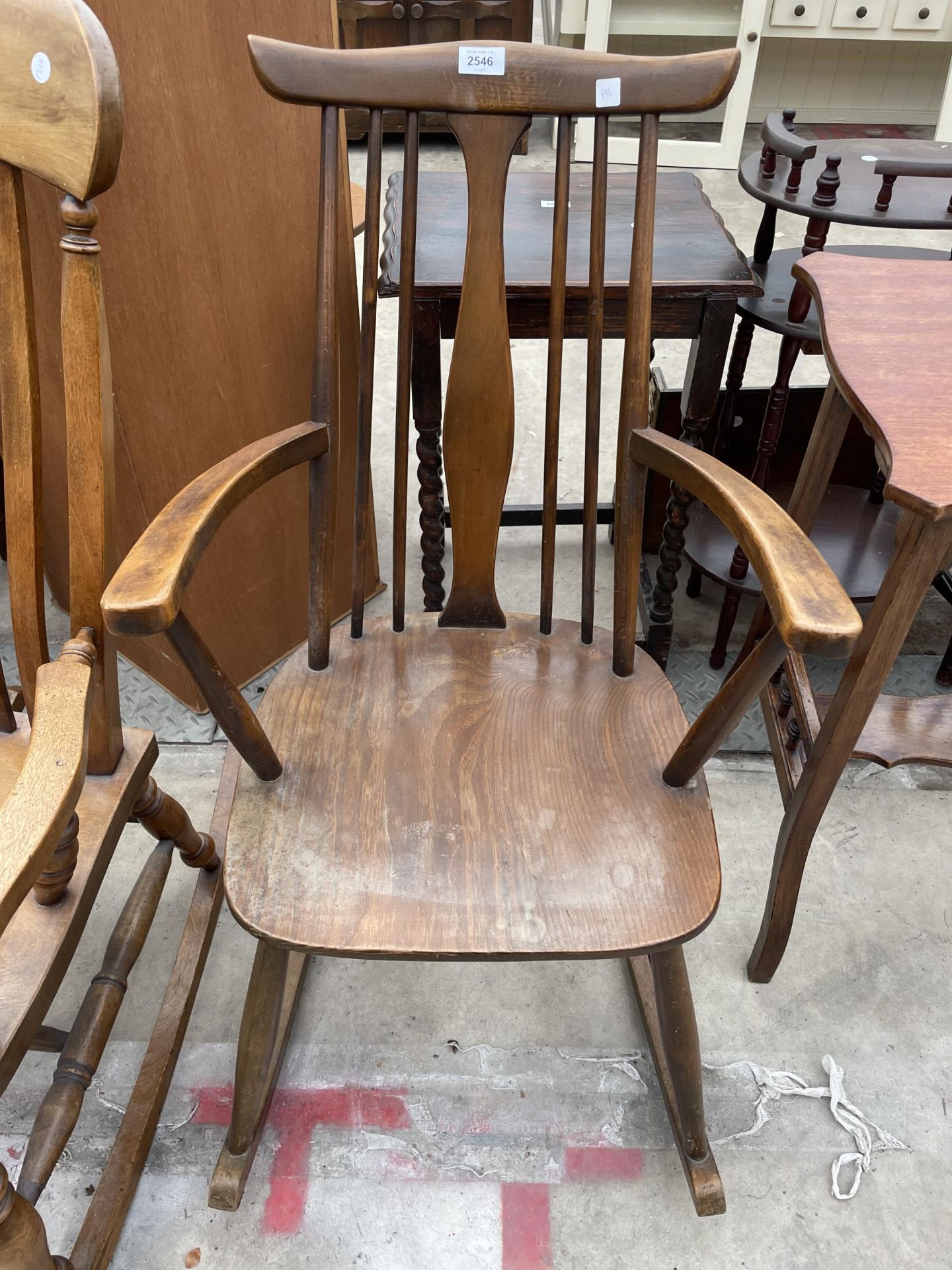 AN ERCOL STYLE ELM AND BEECH ROCKING CHAIR