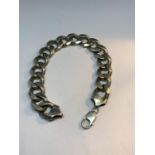 A VERY HEAVY SILVER FLAT LINK WRIST CHAIN