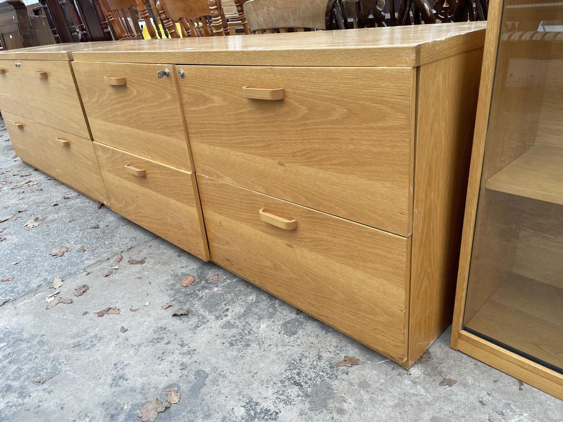 A MODERN OAK GORDON RUSSELL FOUR DRAWER FILING CABINET, 59" WIDE - Image 2 of 3