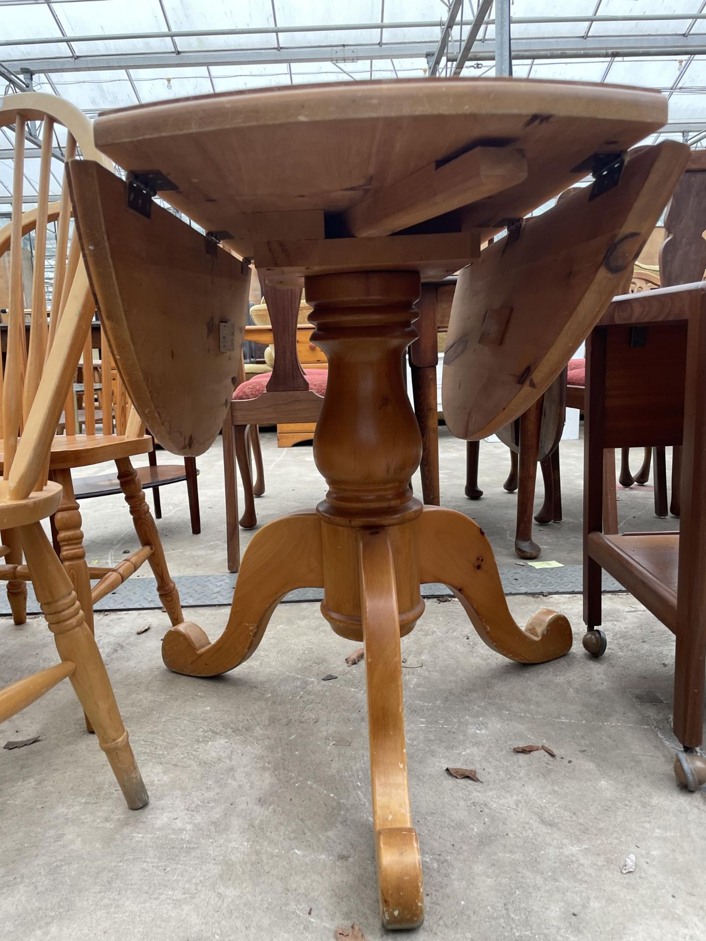 A PINE 42" DIAMETER DROP-LEAF DINING TABLE ON TRIPOD BASE AND A PAIR OF WINDSOR STYLE CHAIRS - Image 3 of 3