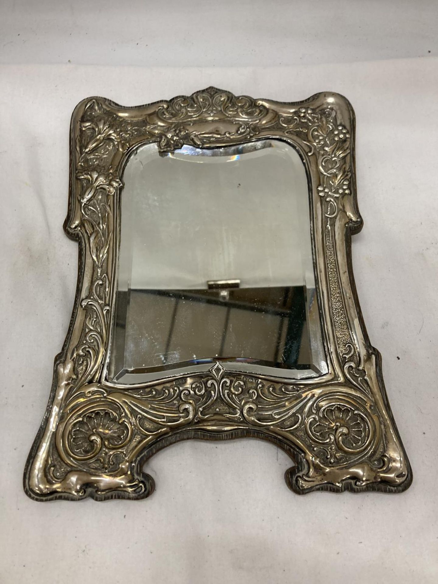 A DECORATIVE HALLMARKED BIRMINGHAM SILVER ART NOVEAU MIRROR