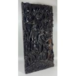 A VINTAGE CHINESE HEAVILY CARVED WOODEN PLAQUE DEPICTING A FIGURE WITH MYTHICAL BEAST, 45 X 22CM