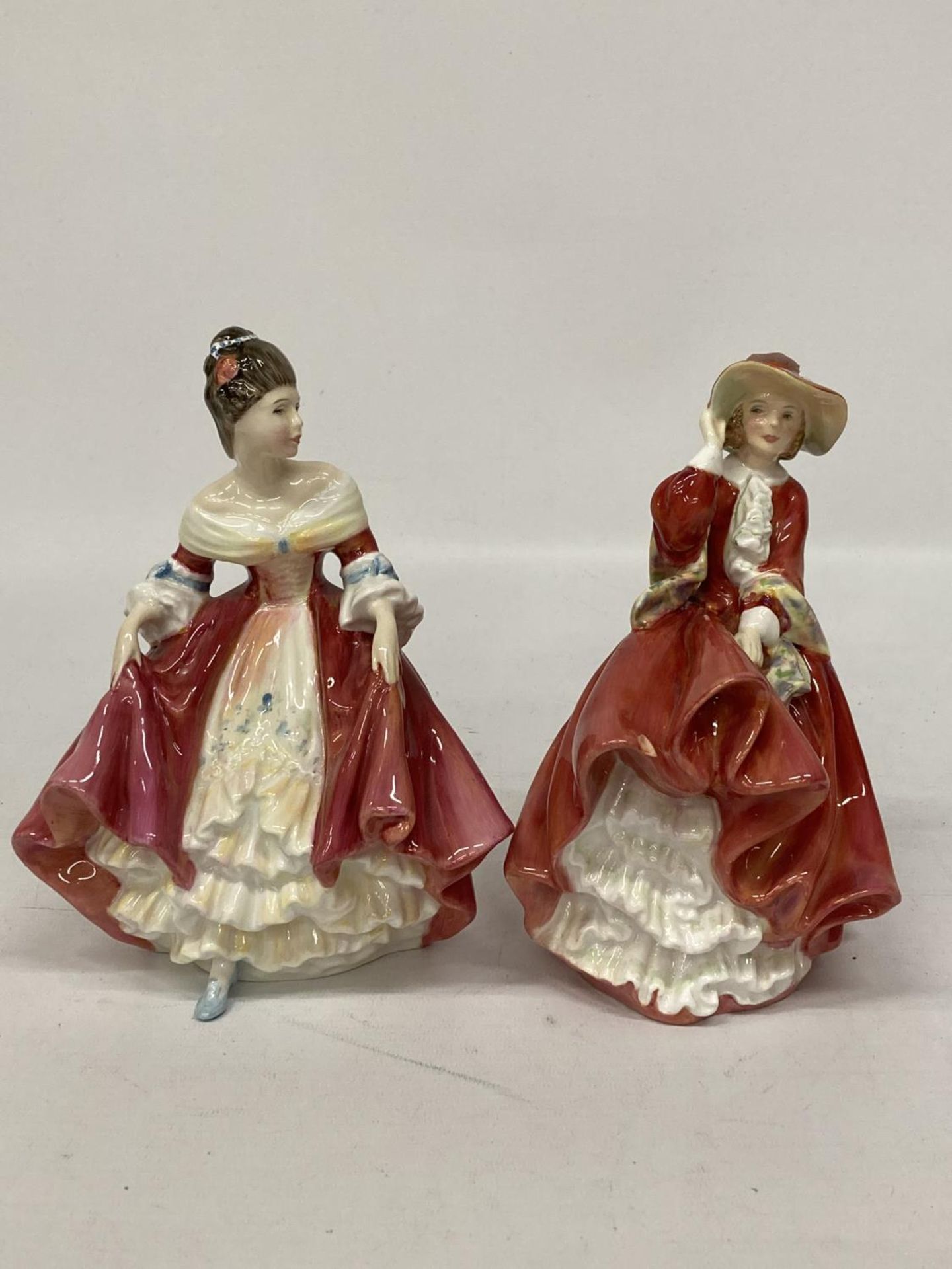 TWO ROYAL DOULTON FIGURINES "SOUTHERN BELLE" HN 2229 AND "TOP O'THE HILL" HN 1834