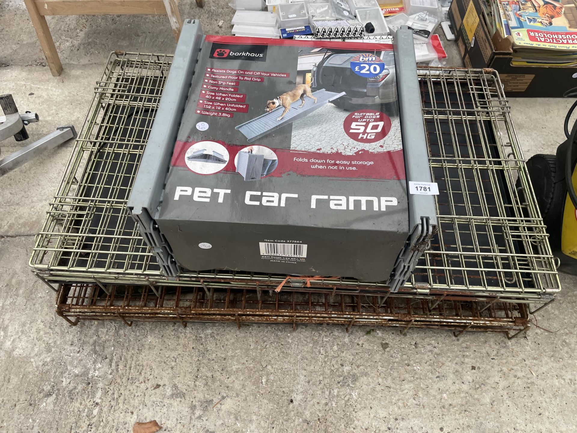 THREE ITEMS TO INCLUDE AN AS NEW PET CAR RAMP AND TWO METAL DOG CAGES
