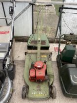 A VINTAGE HAYTER HARRIER ROTARY MOWER COMPLETE WITH GRASS BOX