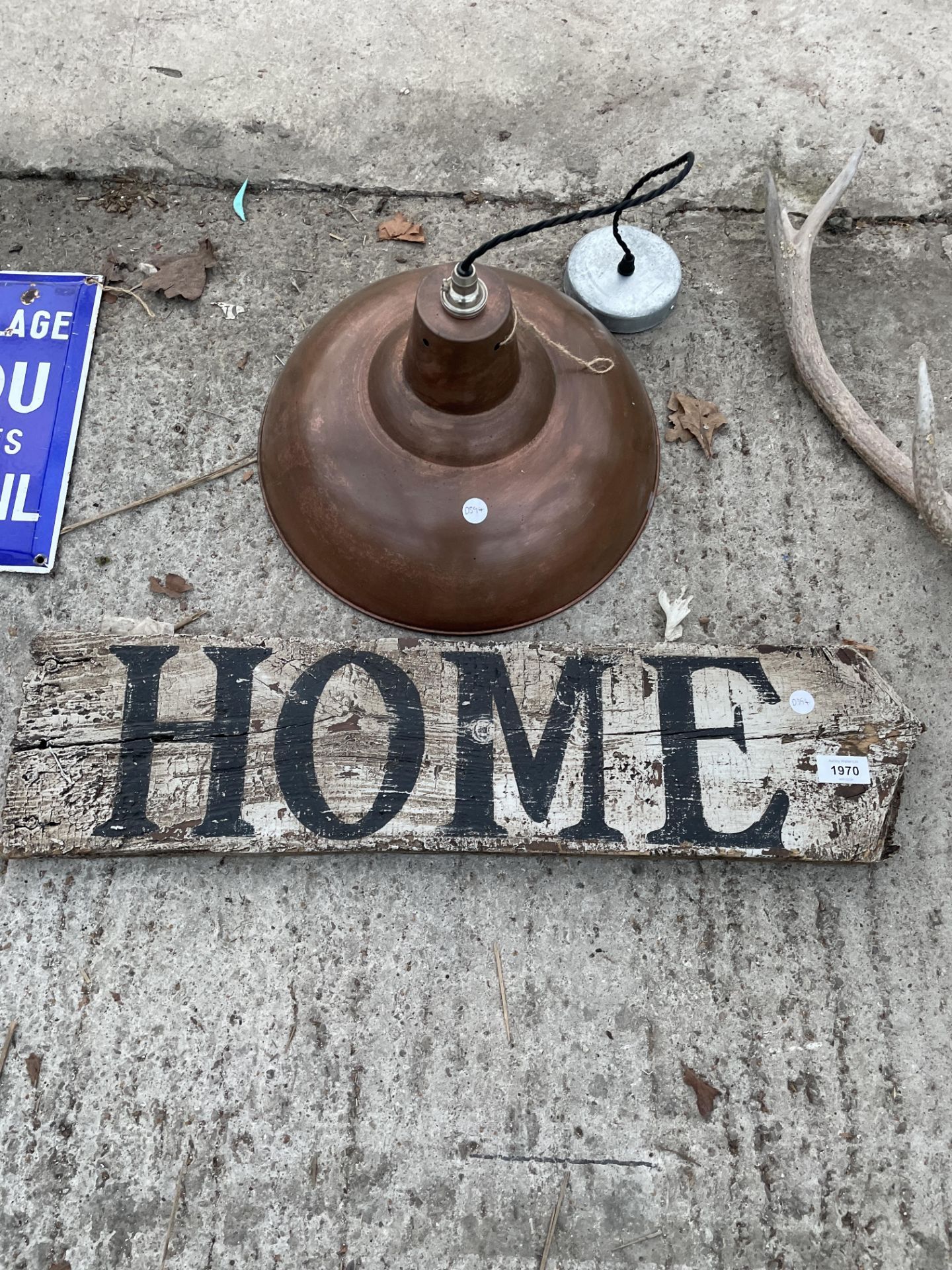A VINTAGE WOODEN 'HOME' SIGN AND A COPPER EFFECT CIELING LIGHT
