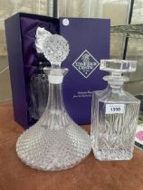 A BOXED ENDINBURGH CYRSTAL DECANTER AND TWO FURTHER GLASS DECANTERS