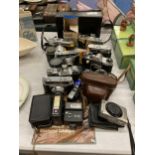 A LARGE COLLECTION OF VINTAGE CAMERAS, CASES, LENS AND FLASHES TO INCLUDE PRATIKA, HANINEX,