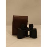 A PAIR OF CARL ZEISS BINOCULARS IN A LEATHER CASE