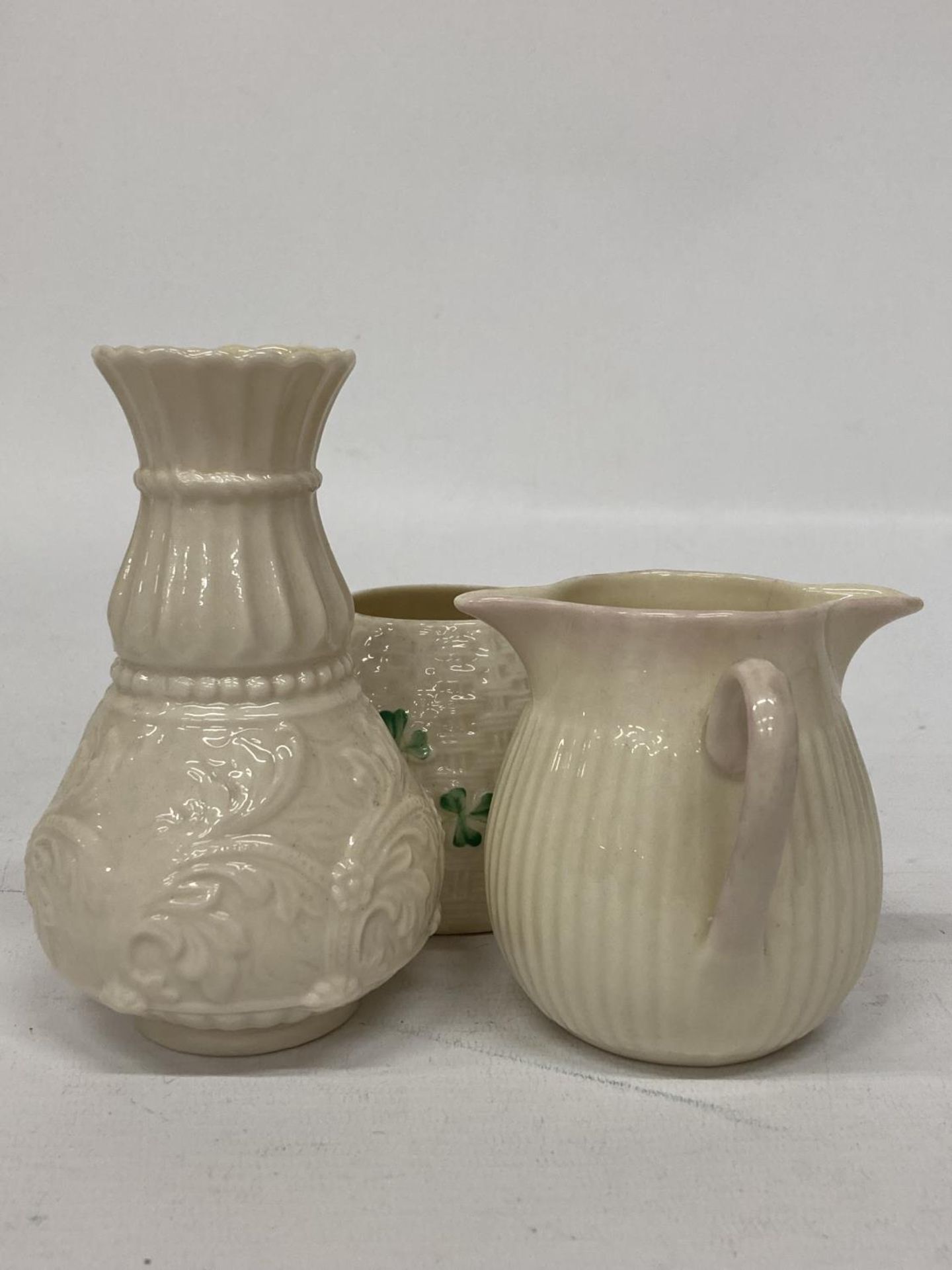 A BELLEEK LILY OF THE VALLEY SPILL VASE TOGETHER WITH A DOUBLE SPOUT CREAMER AND SHAMROCK POT - Image 2 of 3