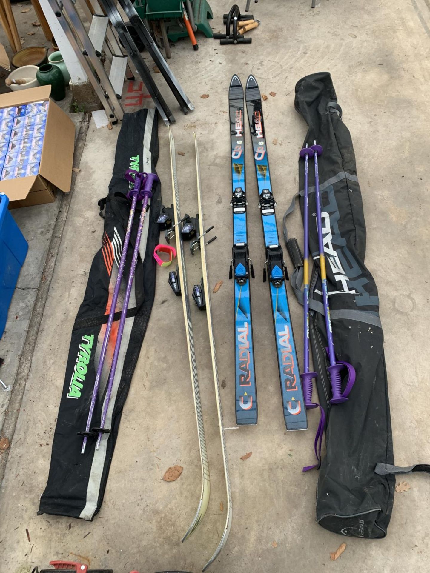 TWO SETS OF SKI'S COMPLETE WITH CARRY CASES