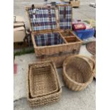 FOUR WICKER ITEMS TO INCLUDE A VINTAGE WICKER HAMPER BASKET AND THREE FURTHER WICKER BASKETS