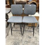 A PAIR OF DUNELM HIGH BACK STOOLS ON TUBULAR FRAME