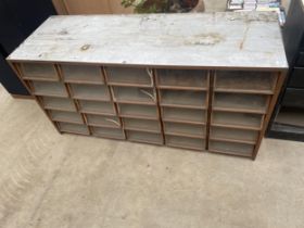 A VINTAGE 25 GLASS FRONTED DRAWER HABERDASHERY CABINET LENGTH 153CM, HEIGHT 77CM