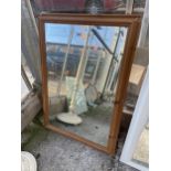 A PINE FRAMED WALL MIRROR AND WHITE PAINTED MIRROR