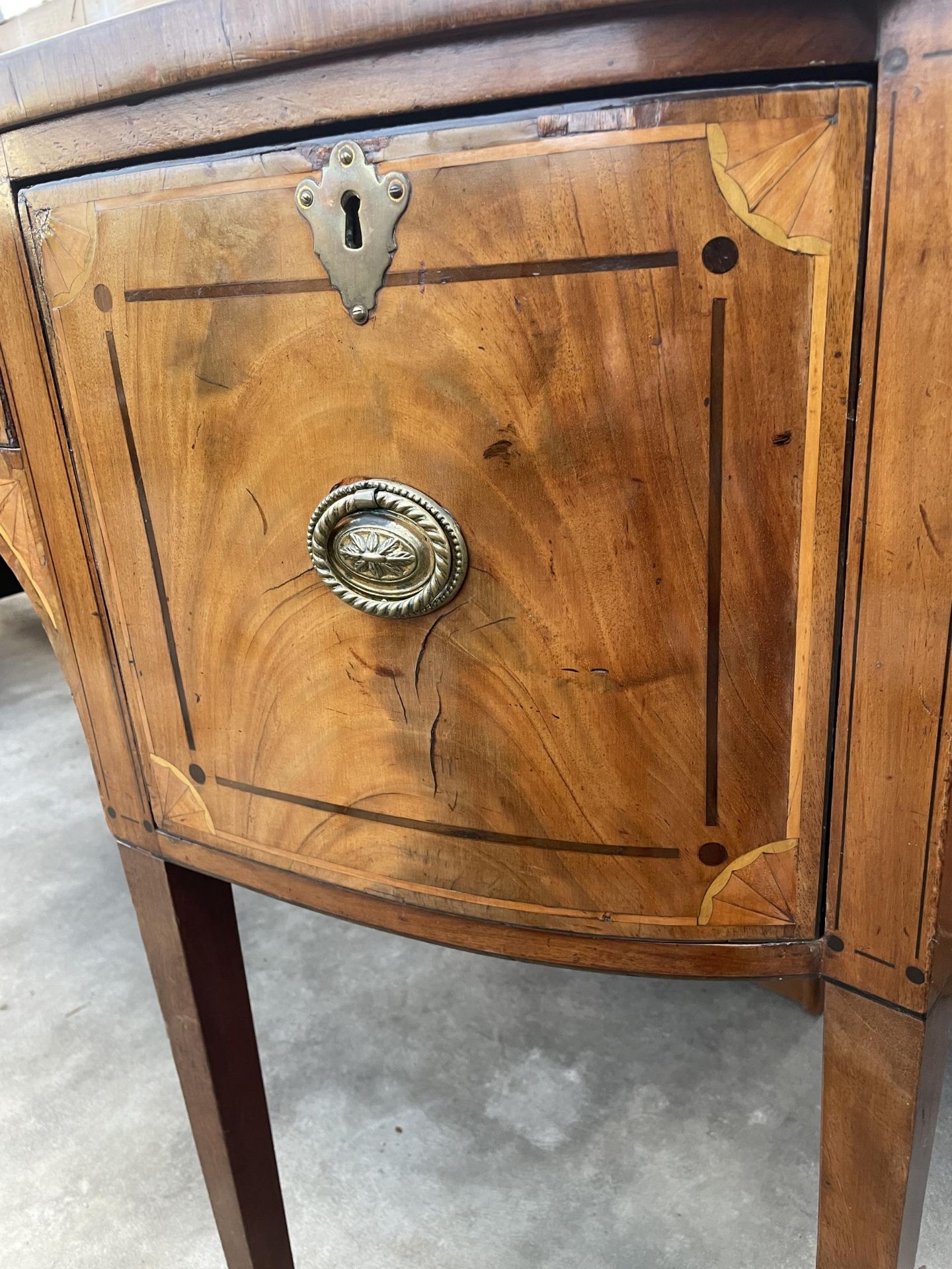 A 19TH CENTURY MAHOGANY INLAID AND CROSSBANDED BOWFRONTED SIDEBOARD ENCLOSING THREE DRAWERS, 60" - Image 5 of 7