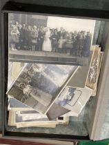 A BOX CONTAINING OLD BLACK AND WHITE AND SEPIA PHOTO'S