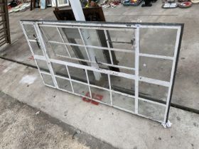 A VINTAGE 24 SECTION CAST METAL WINDOW FRAME