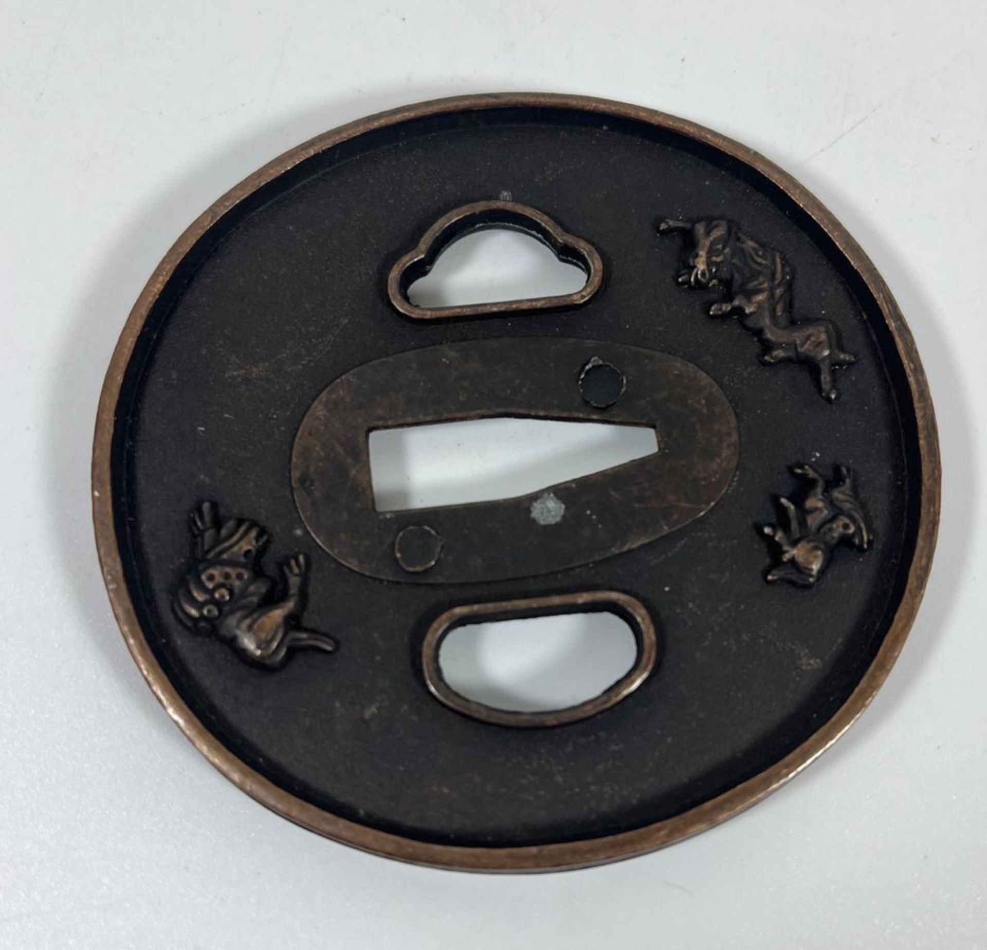 A JAPANESE BRONZE TSUBA WITH MYTHICAL BEAST DESIGN, DIAMETER 7.5 CM - Image 2 of 4