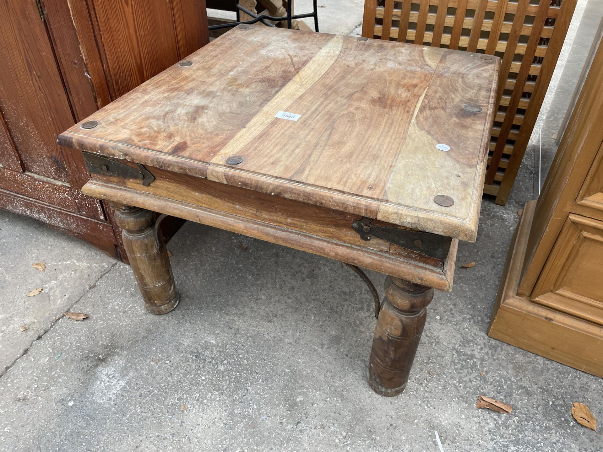 A HARDWOOD LAMP TABLE