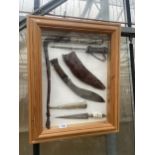 A PINE DISPLAY WALL HANGING FRAME WITH AN ASSORTMENT OF KNIVES