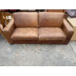 A MODERN BROWN LEATHER THREE SEATER SETTEE