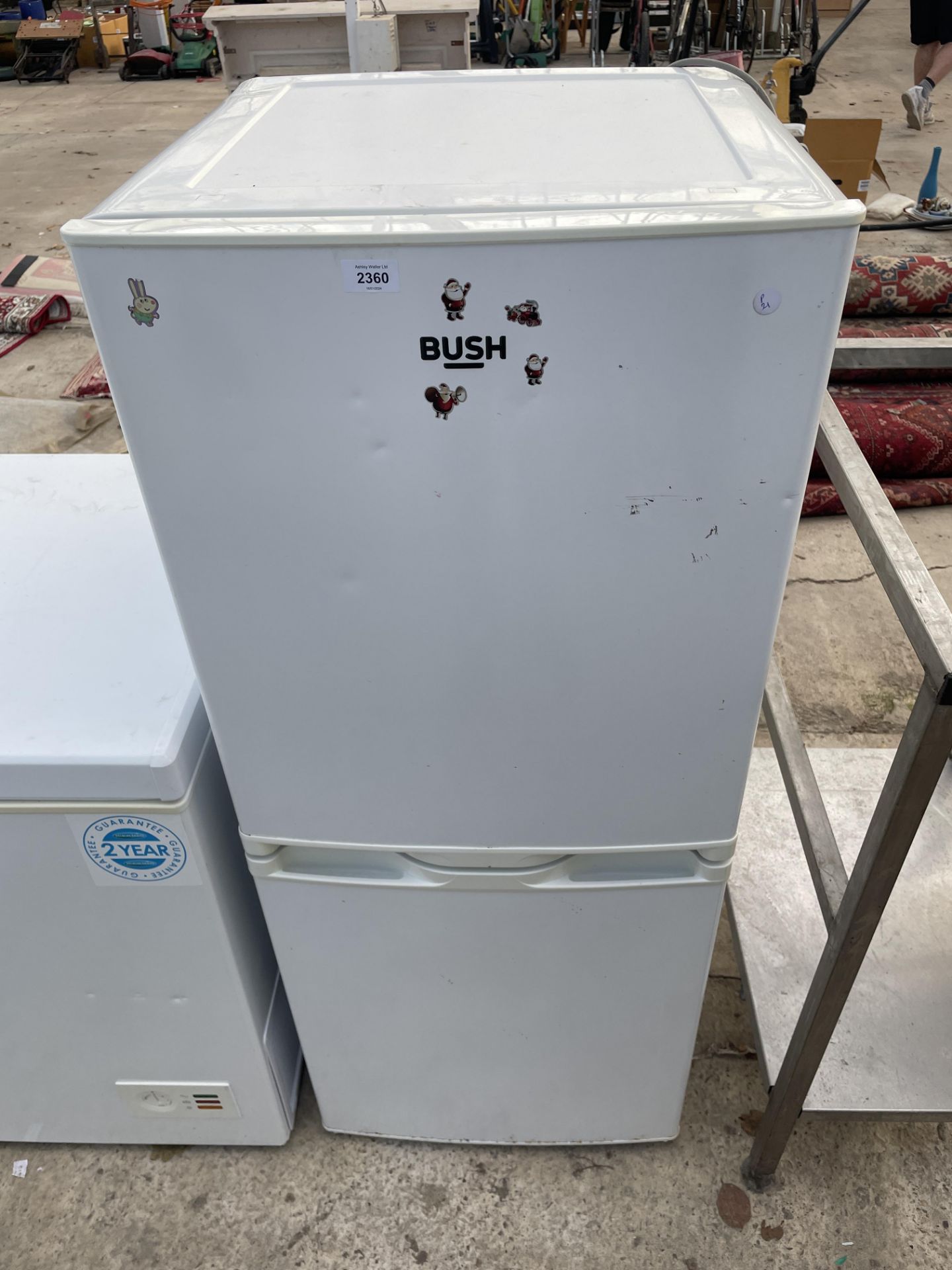 A WHITE BUSH UPRIGHT FRIDGE FREEZER