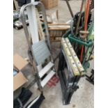 THREE ITEMS TO INCLUDE TWO BUILDERS TRESTLES AND A THREE RUNG ALUMINIUM STEP LADDER