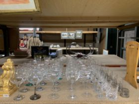 A LARGE QUANTITY OF DRINKING GLASSES