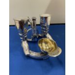 AN ELKINGTON SILVER PLATED CRUET SET IN THE GUISE OF RIDING BOOTS AND HAT ST ON A HORSE SHOE BASE