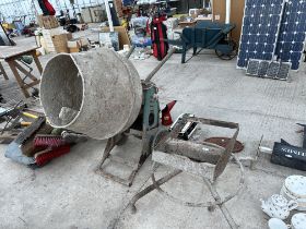 AN ELECTRIC CEMENT MIXER WITH STAND