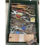 A LARGE ASSORTMENT OF VINTAGE HAND TOOLS TO INCLUDE SAWS AND SPANNERS ETC