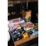 A QUANTITY OF BOARD GAMES, ETC TO INCLUDE GUESS WHO, DINO BITE, GADGET SHOP SCIENCE PENALTY SHOOT