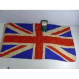 A MID 20TH CENTURY SILK UNION JACK, 43 X 86CM, A REPLICA GERMAN IRON CROSS AND AN ACME SCOUT WHISTLE