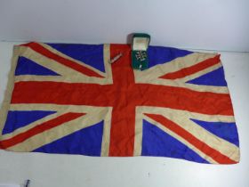 A MID 20TH CENTURY SILK UNION JACK, 43 X 86CM, A REPLICA GERMAN IRON CROSS AND AN ACME SCOUT WHISTLE