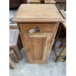 A LATE VICTORIAN PINE POT CUPBOARD