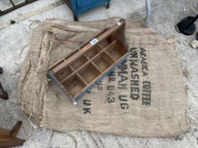 AN ASSORTMENT OF HESSIAN SACKS AND A MULTISECTION WOODEN STORAGE BOX