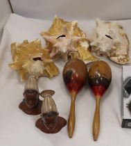 THREE LARGE CONCH SHELLS, A PAIR OF MARACAS AND TWO AFRICAN STYLE BUSTS