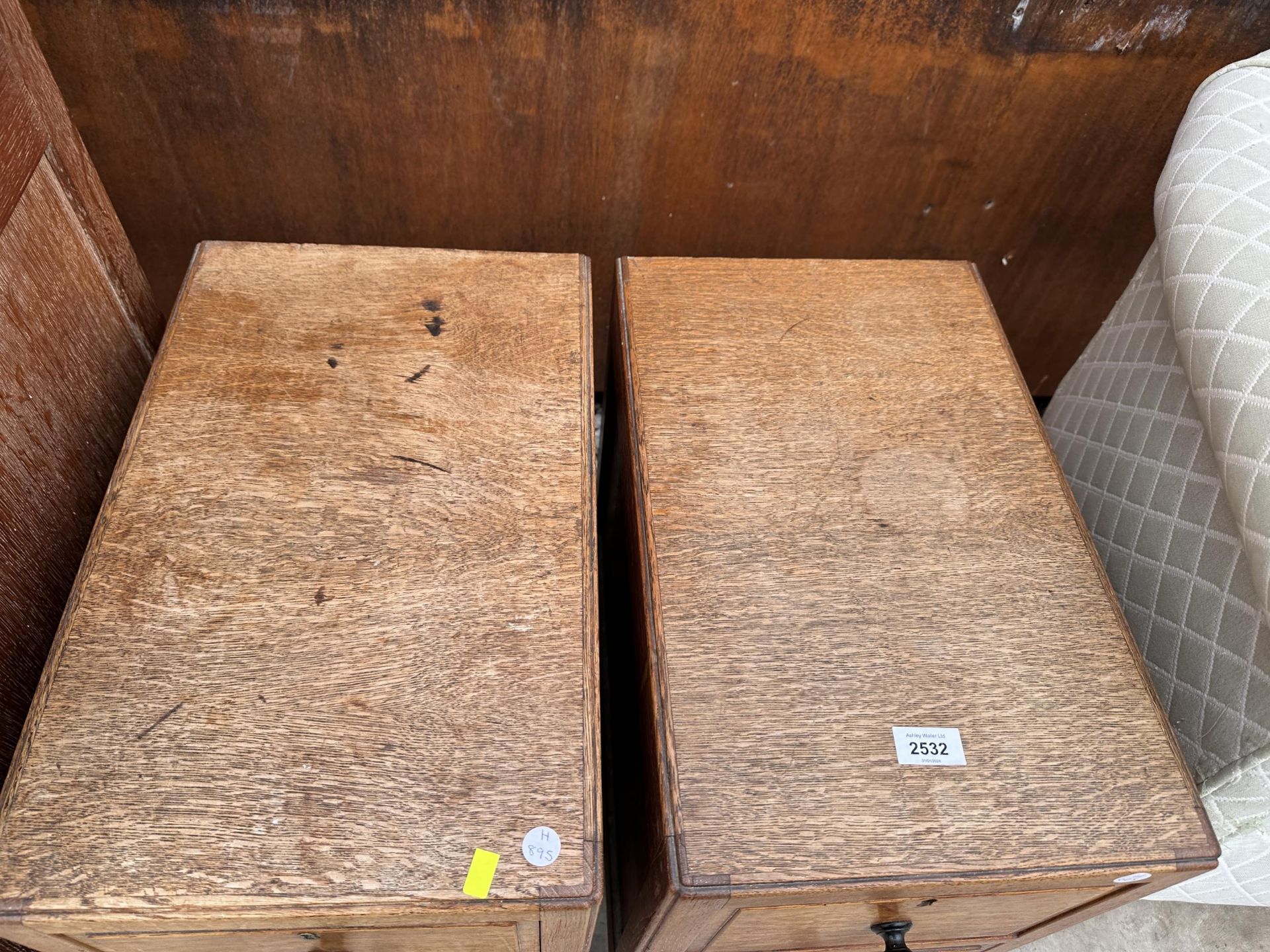 A PAIR OF HEAL AND SON (LONDON) LIMED OAK TWO DRAWER BEDSIDE CHEST WITH EBONISED KNOBS, PLEASE - Image 2 of 5