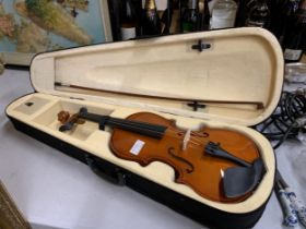 A NEW VIOLIN IN CASE WITH BOW