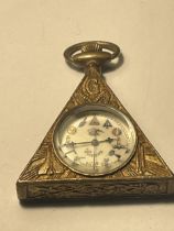 A BRONZE MASONIC TRIANGULAR SHAPED WATCH