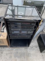 A CABINET CONTAINING A LARGE QUANTITY OF SONY STEREO EQUIPMENT